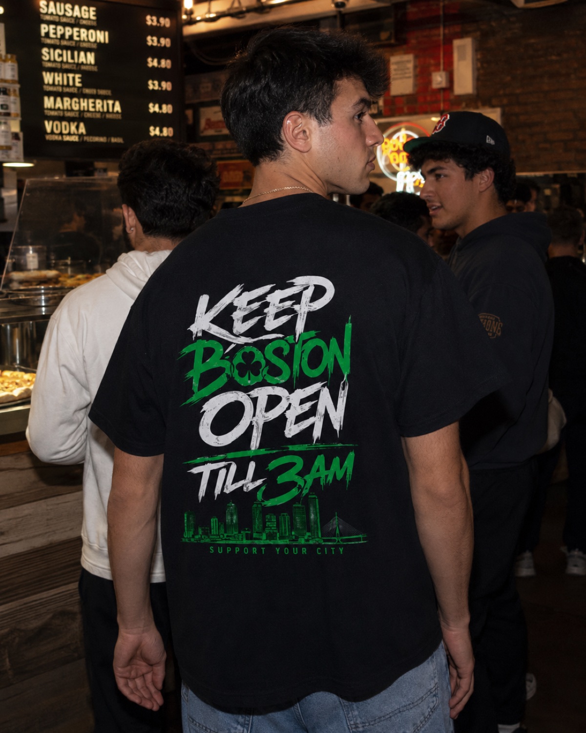 Keep Boston Open Till 3AM tee worn at a late-night Boston pizza spot