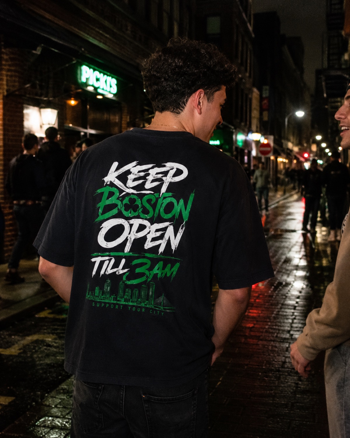 Boston Bedtime tee worn on a Boston street at night